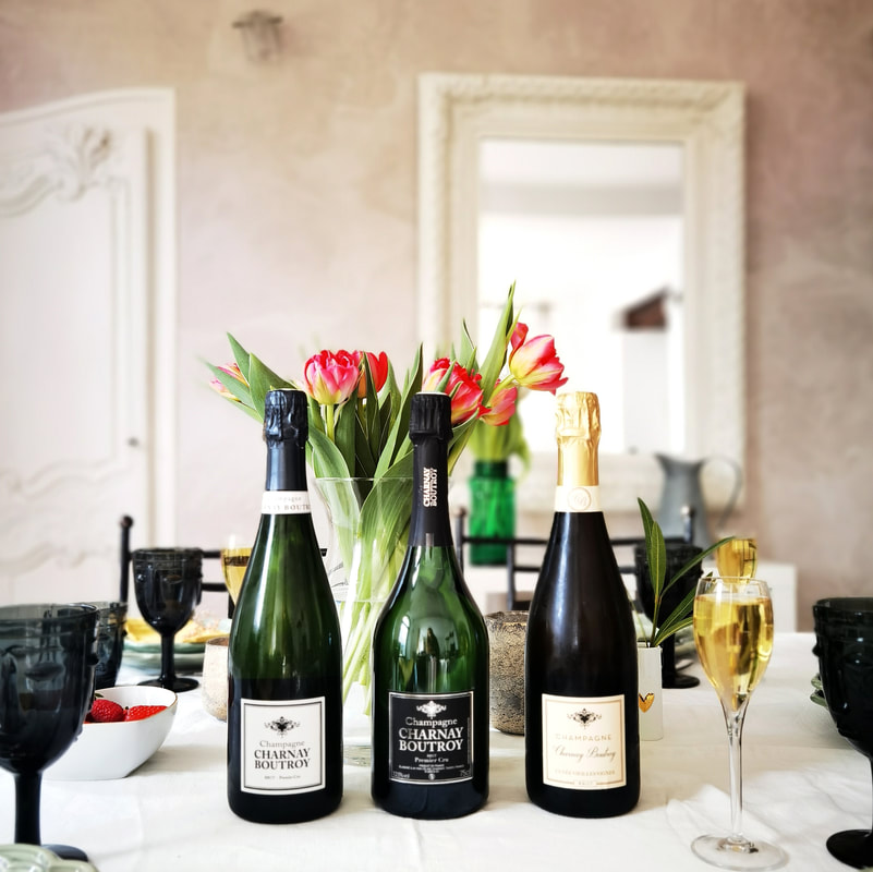 Trois bouteilles de la gamme Charnay Boutroy